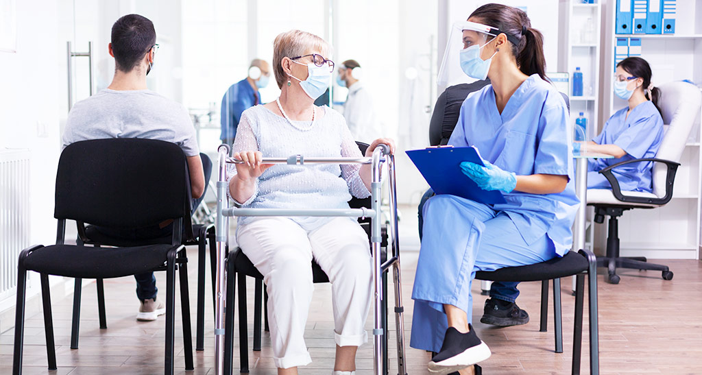 Nexsun Labs Skilled Nursing Facilities Nursing staff is discussing treatment with senior woman